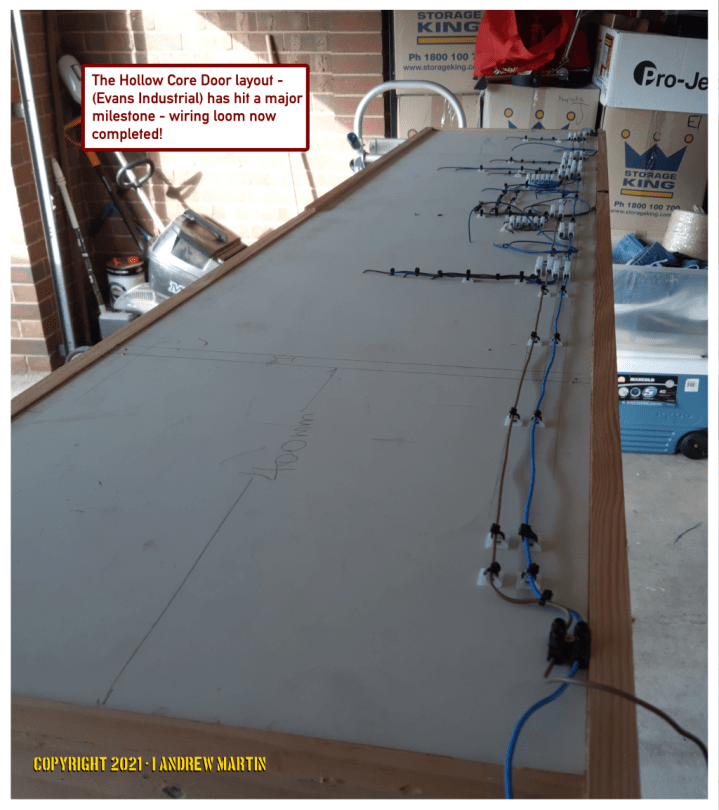 THe wiring completed on the underside of the layout board - April 29, 2021