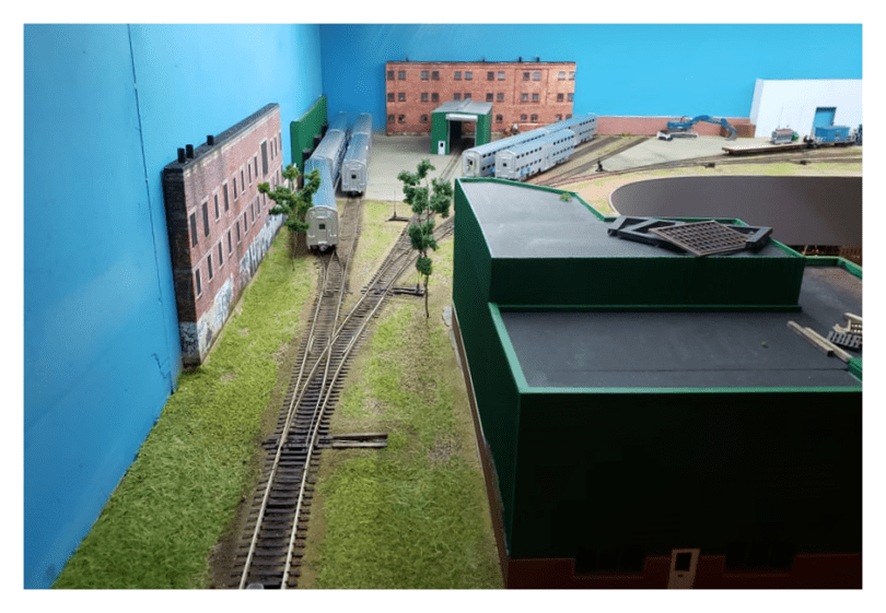 Image 2: Looking over the administration building toward the storage and engine tracks