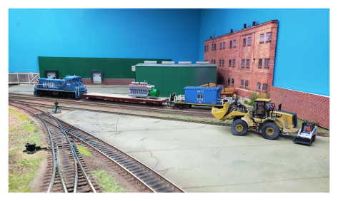 Image 4: A Metra transfer run prepares to leave for the heavy maintenance centre with a tired motive power unit