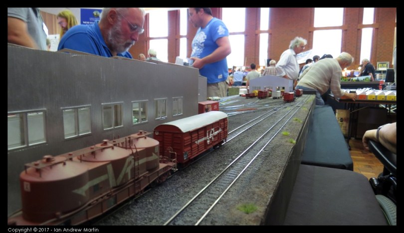 Image 3: A Victorian Railways (VR) bulk cement hopper and VLX van beside the pit-road shed toward the front of the layout.